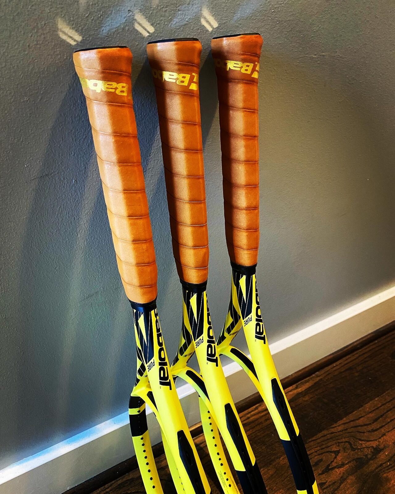 Custom gripped Babolat racquets