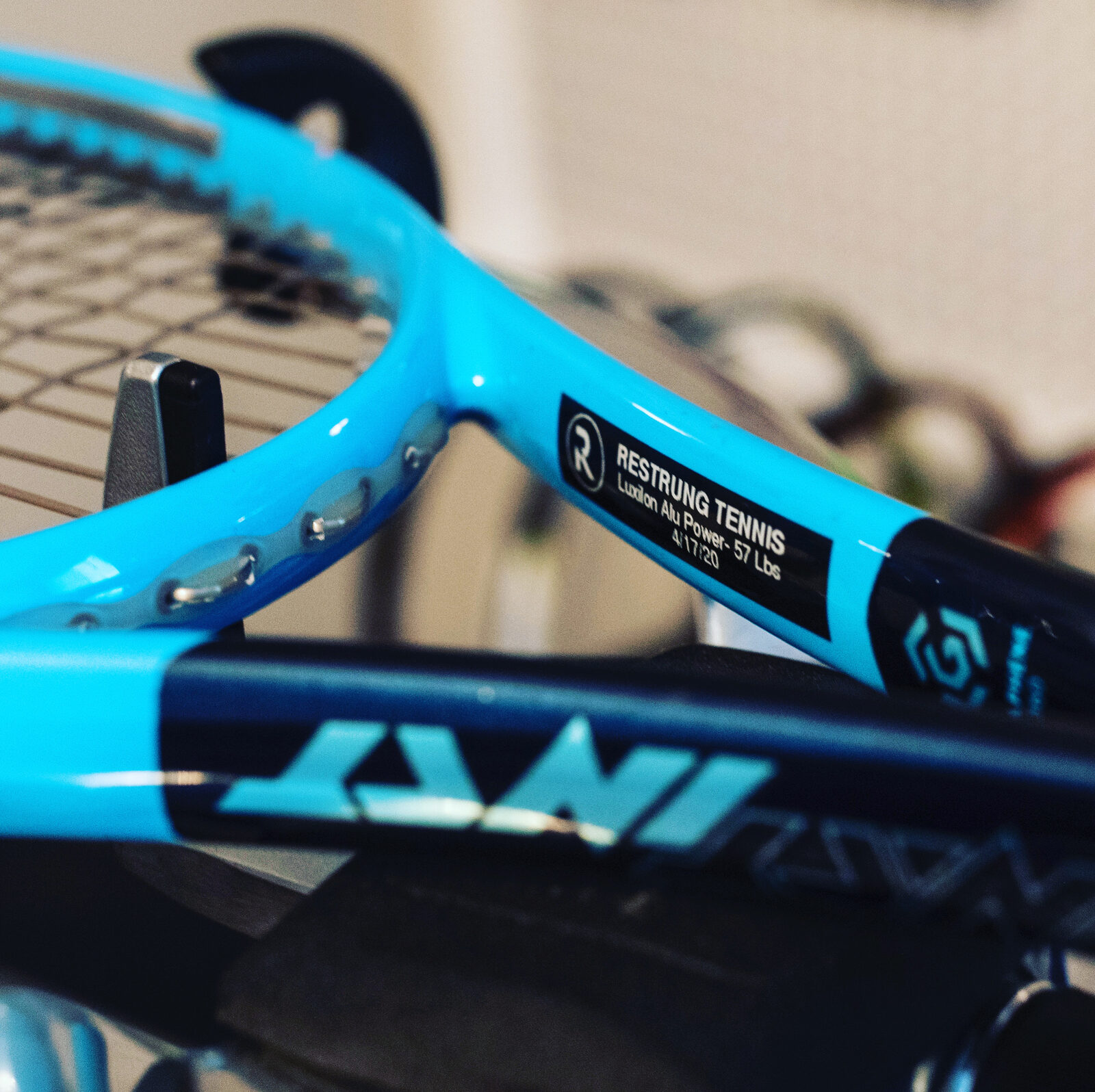 Restrung Tennis label